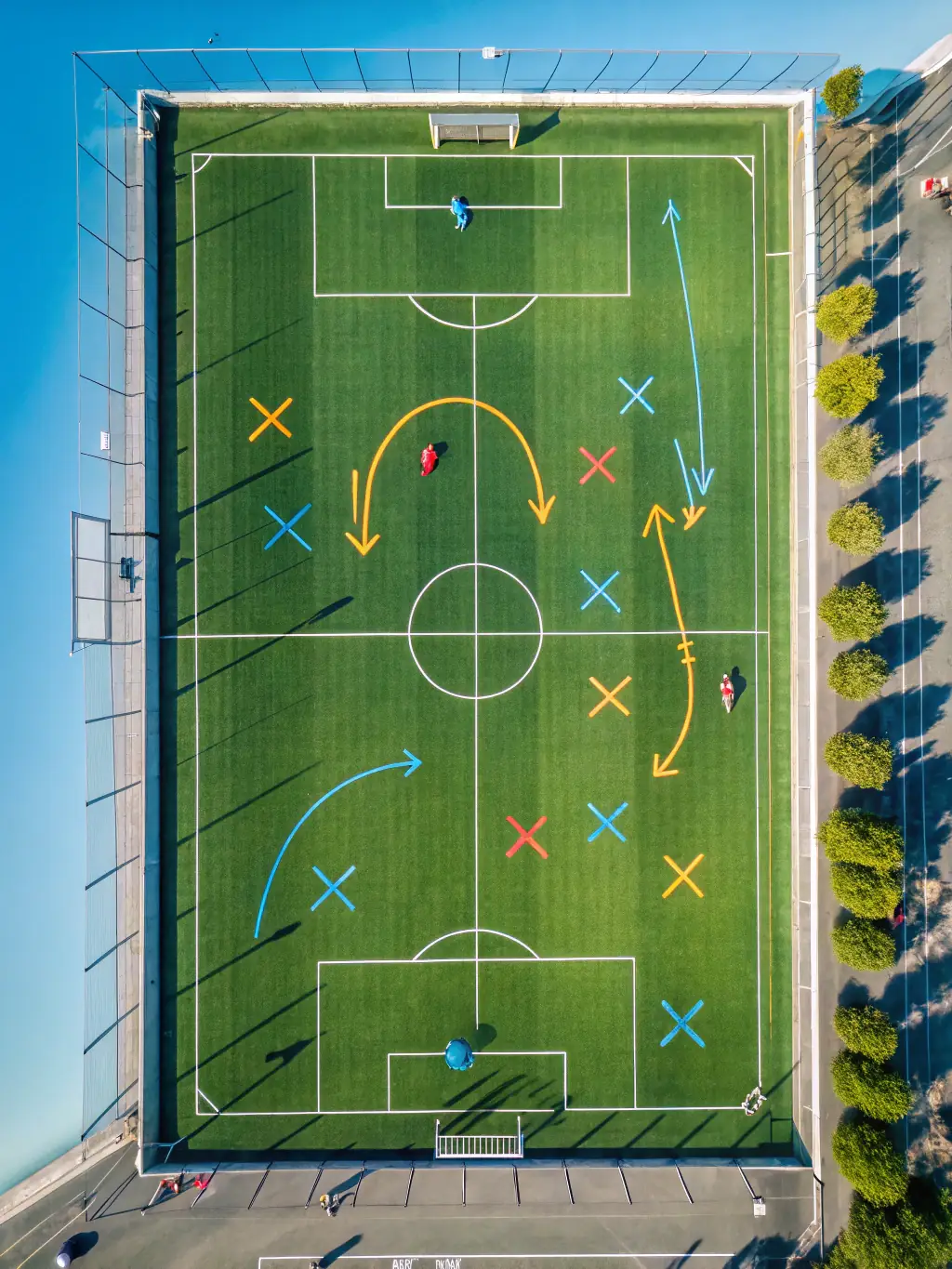 A vibrant image of children playing soccer in a sunny field, representing the youth soccer program offered by ASS SPORTS LOISIRS DE LA VALLEE DE L ECHELLE.